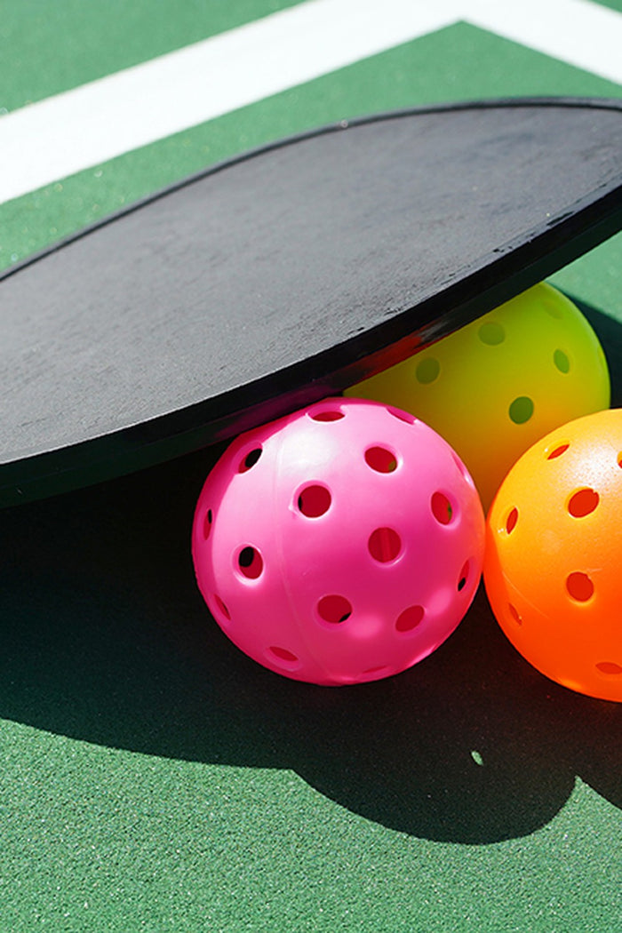 Pickleball paddle and balls