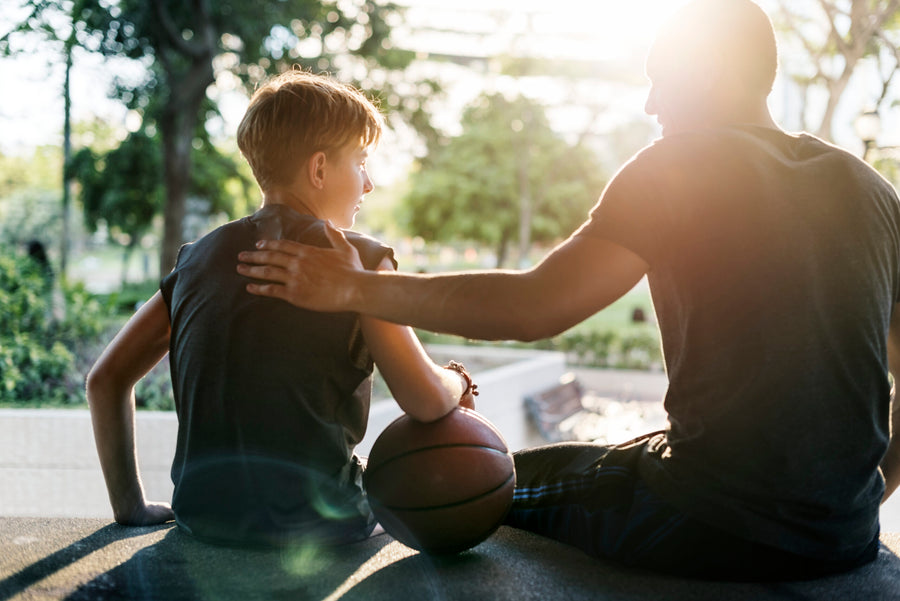 Dad encouraging sport