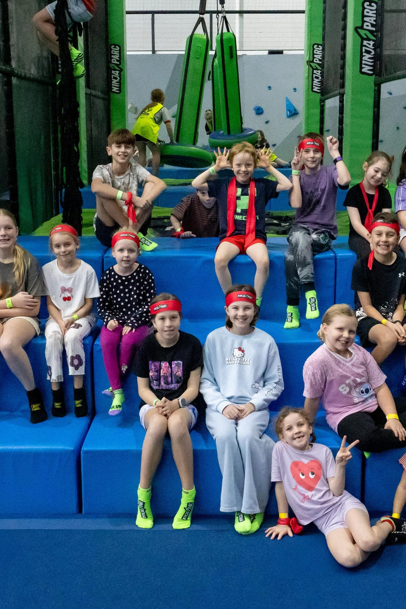 Happy group of kids at an ASC parkour program