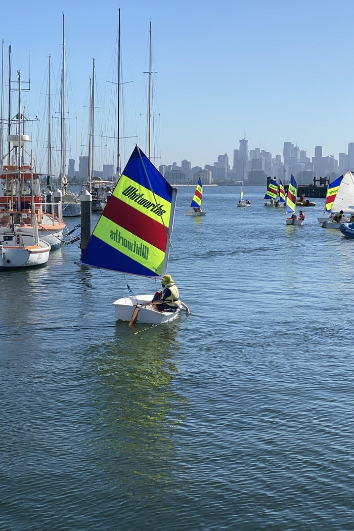 Setting sail within the sheltered marina at an ASC sailing camp at the RVYC